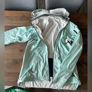 Women’s Sugoi running/biking waterproof jacket Med
